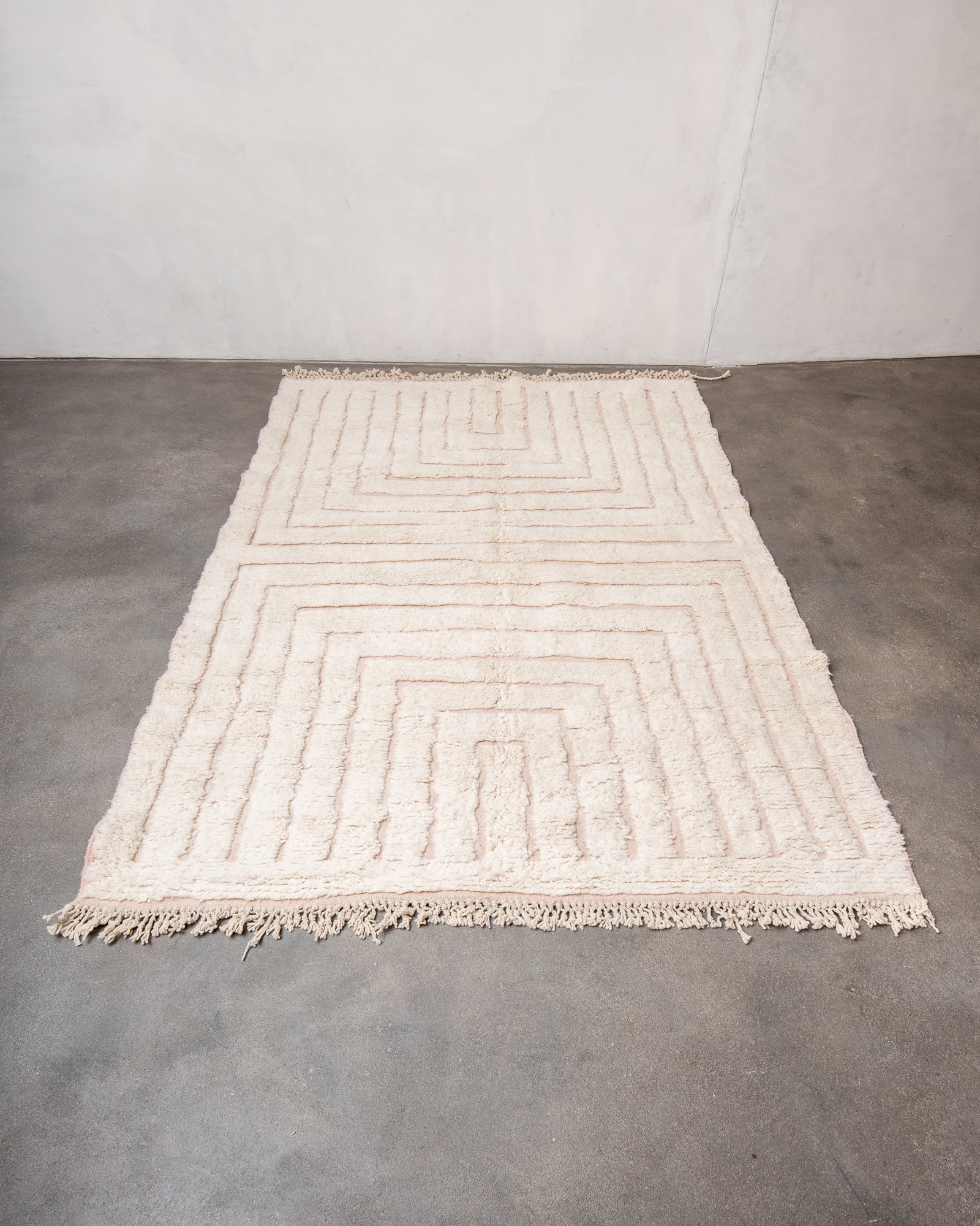 Modern, designer, handcrafted Berber rug from Morocco. Beniourain carpet with beautiful colours and patterns and fluffy wool texture.